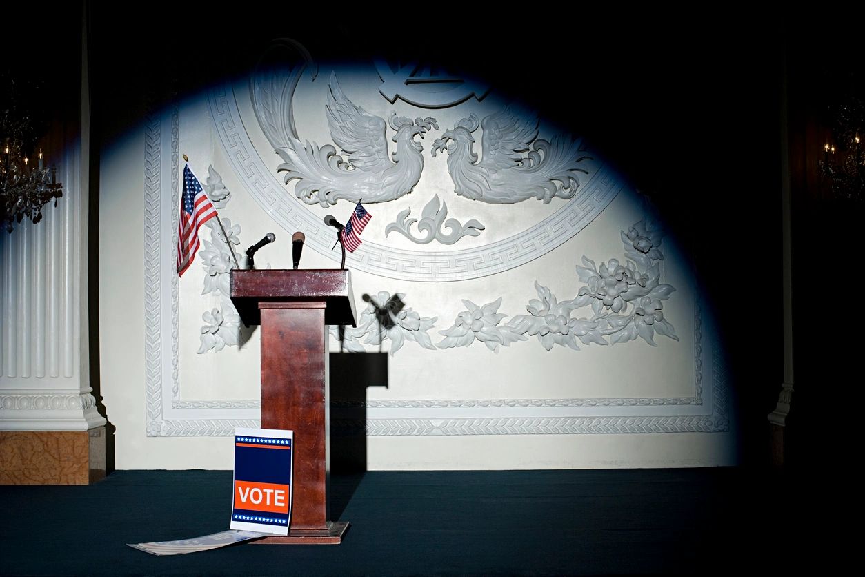Civic building podium with vote sign
